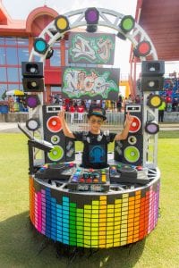 Nicholas Shand portraying DJ Nico 