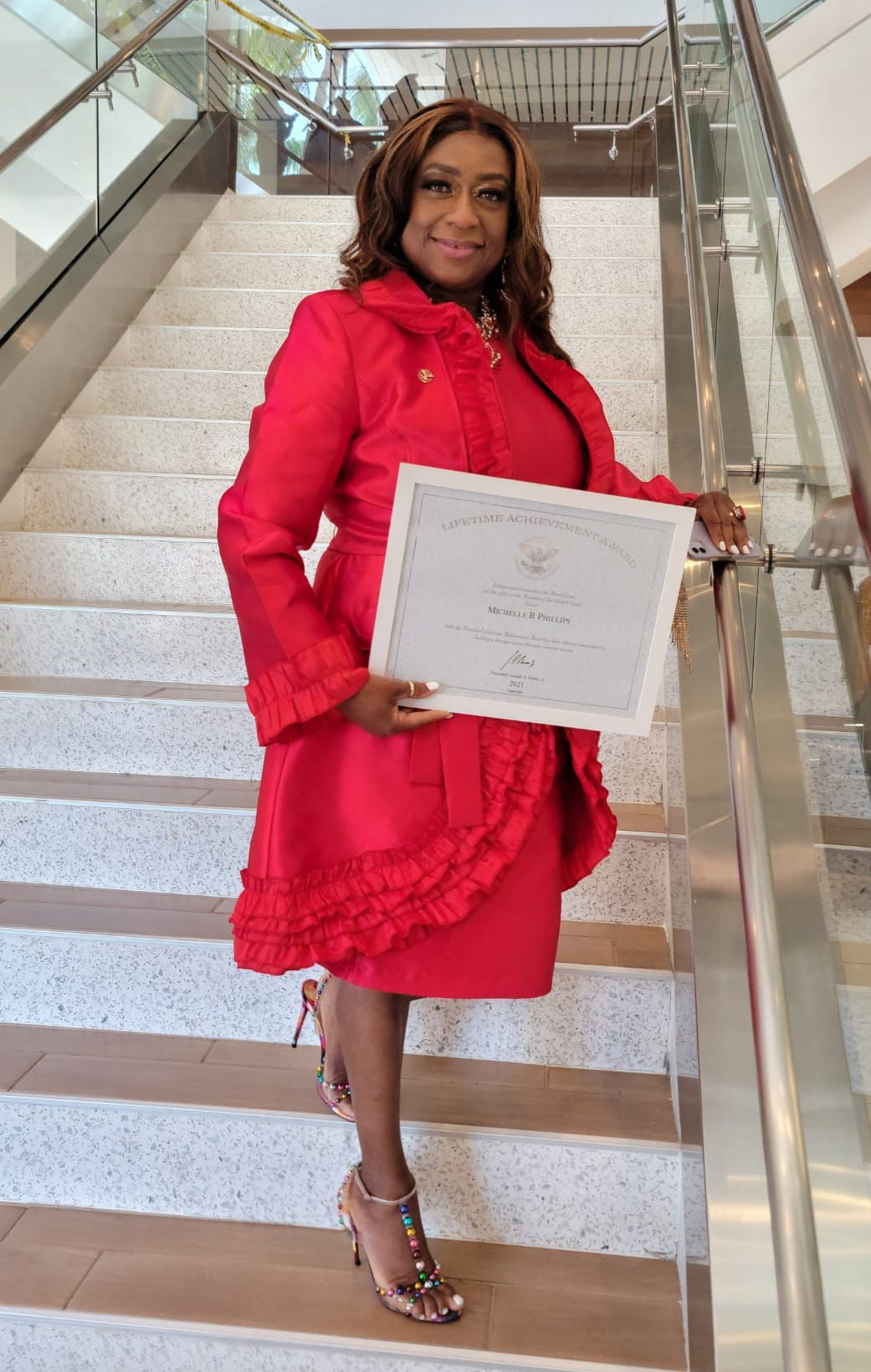 Dr Michelle Richards with her Lifetime Achievement Award