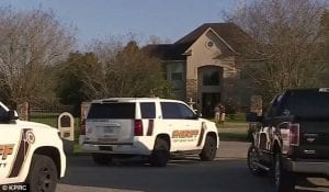 Police vehicles parked outside the fateful home where Dr Sherylin Burroughs was killed by her husband