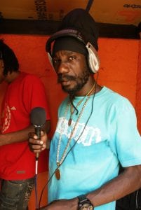 Sizzla wears the AnSWeR