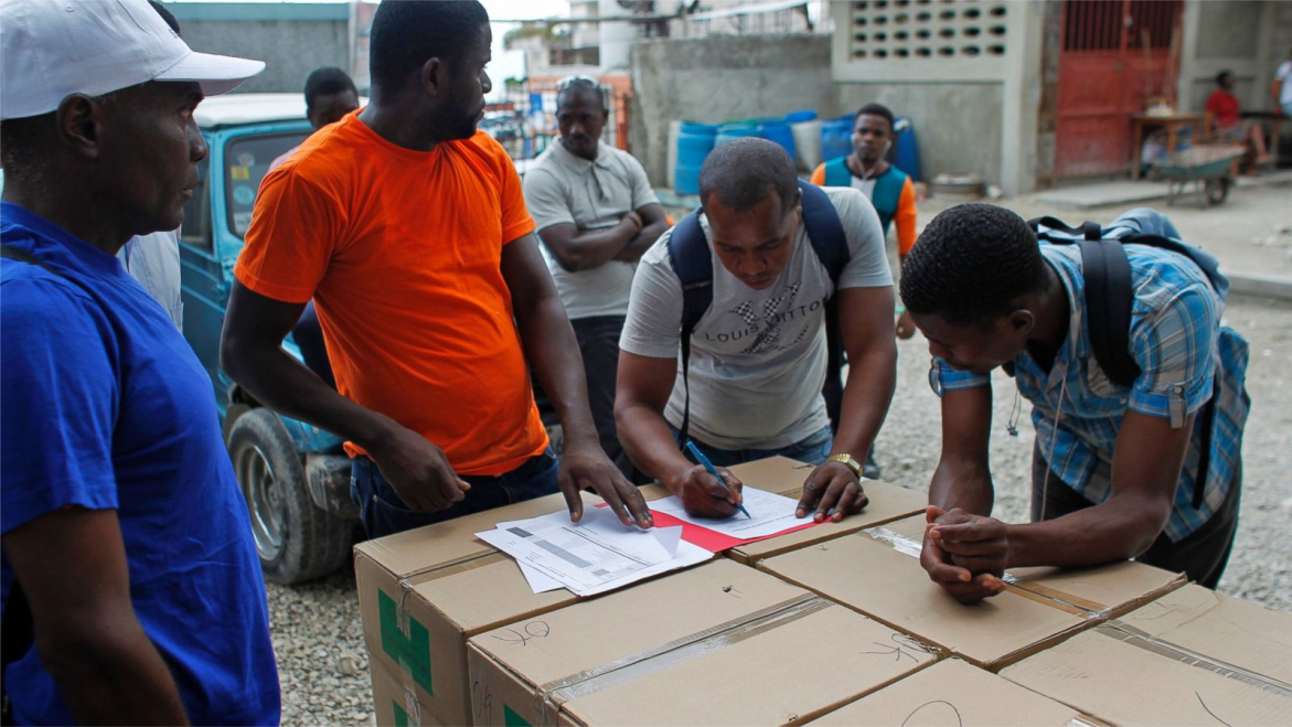 haiti-counting-ballots-voters-fill-out-forms