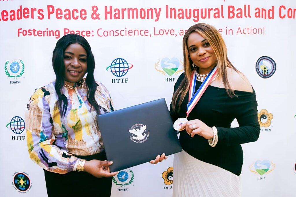 Reverend Marie Berbick celebrates her award with Akelia Thompson, Social Media Manager, Marie Berbick Ministries 

International.

Photo courtesy of Marie Berbick Ministries International