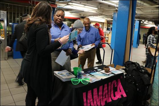 Jamaica Tourist Board’s Business Development Managers, Marcia Sinclair (second left) and Kenton Senior (right), interact with PATH commuters/